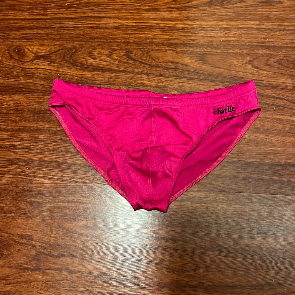 Charlie by Matthew Zink pink speedo.